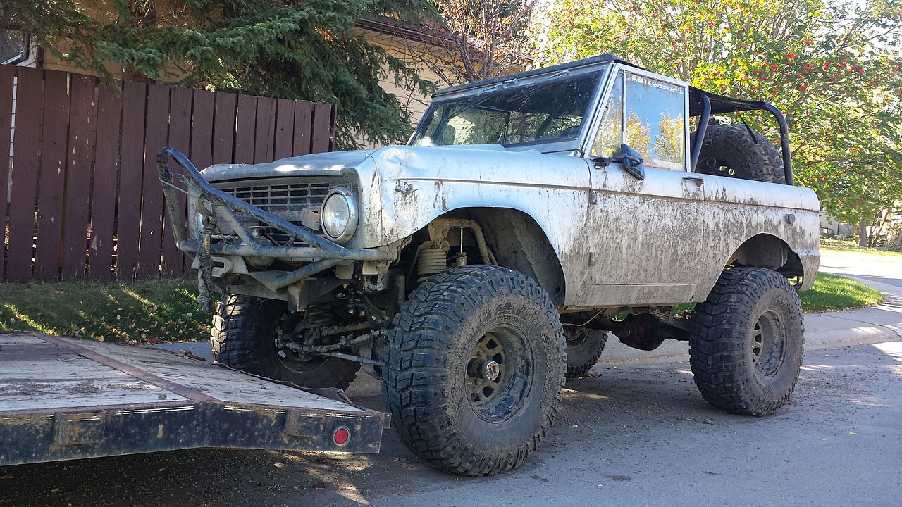 78 Silver Bronco Lifted on Super Swampers