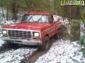 Old red in the snowy mud.